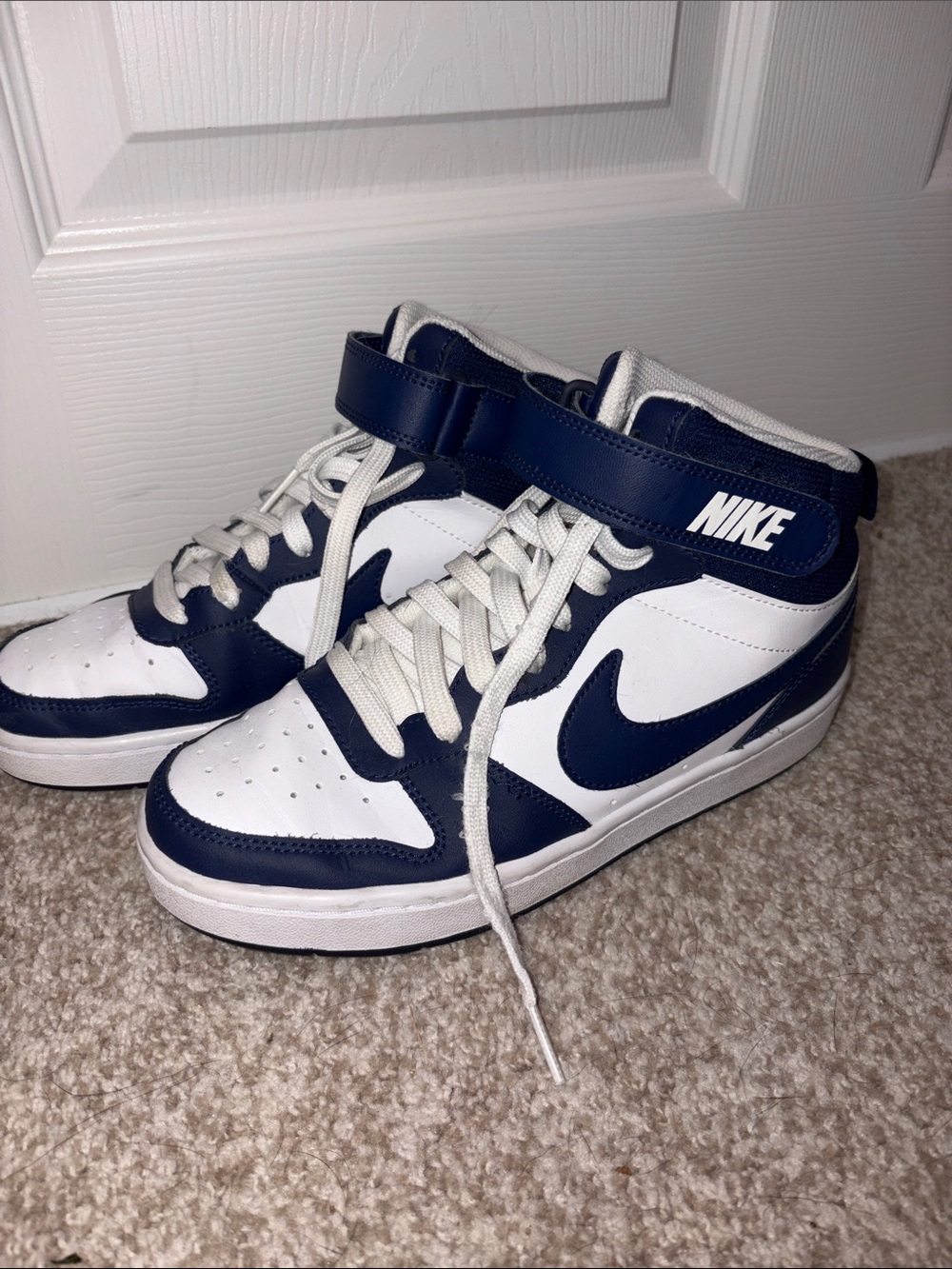 Nike High-Top Sneakers in White and Navy Blue
